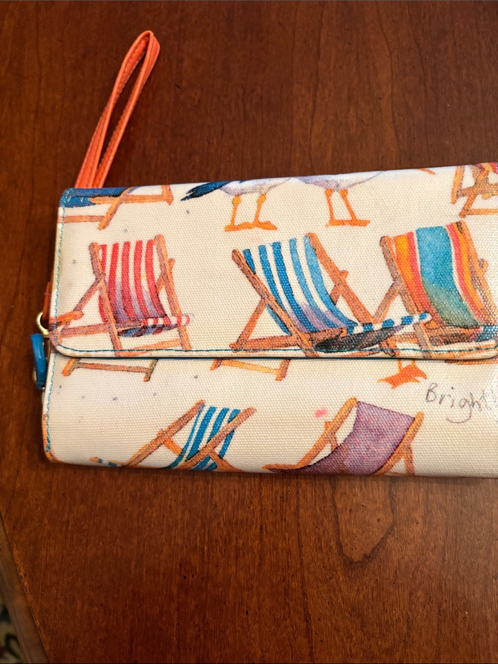 Wristlet Clutch with Colorful Beach Chair Print - Orange Accents